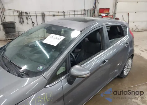 2014 Ford Fiesta Titanium из США, поврежденный, VIN 3FADP4FJ4EM220367